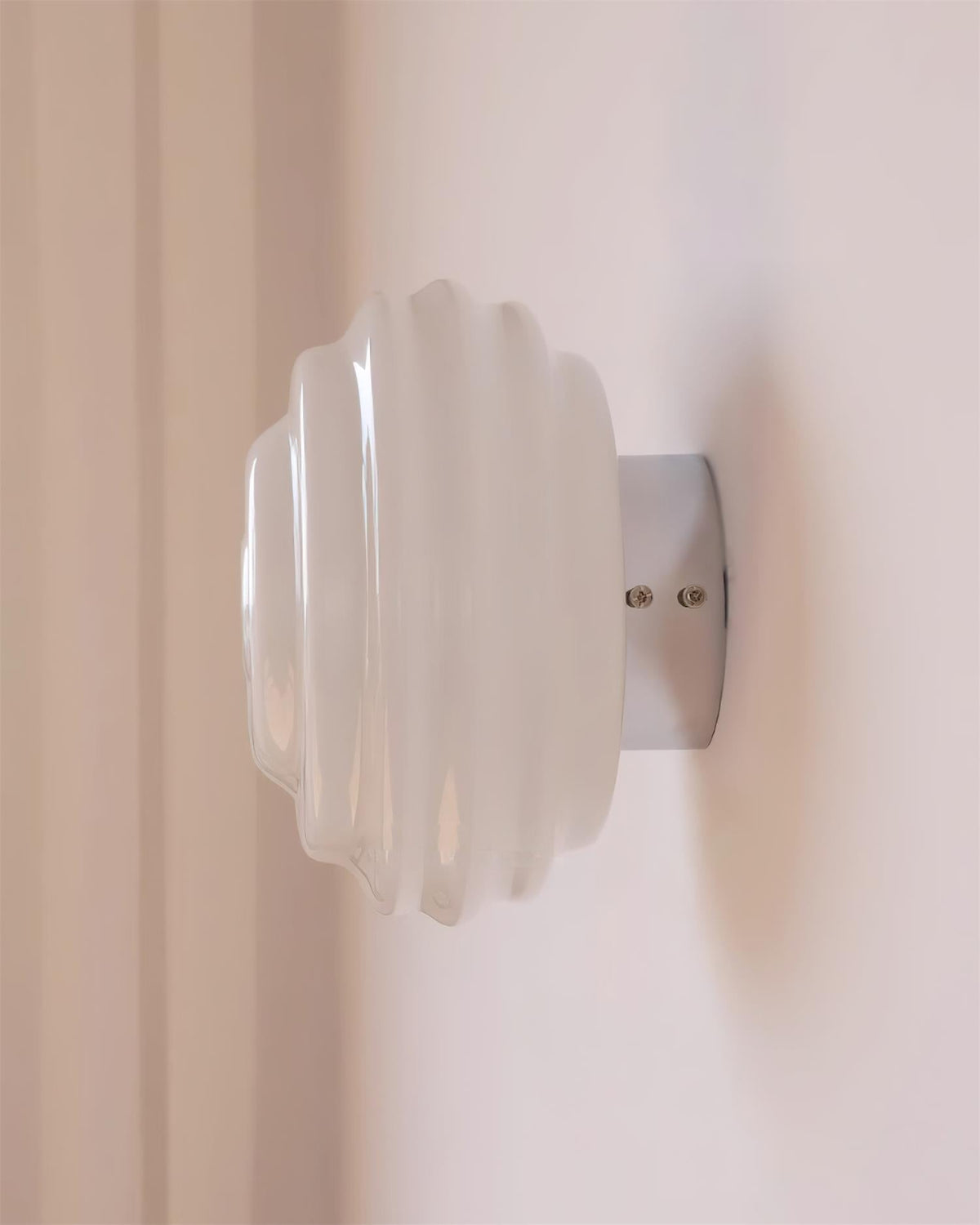 Celalelle wandlamp met glas in goudkleurige afwerking