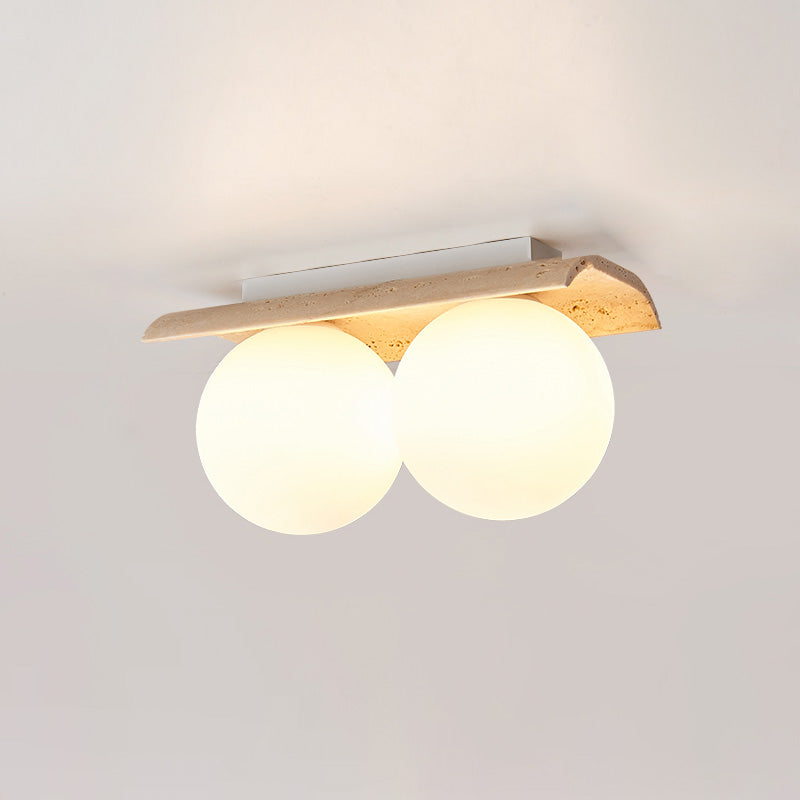 Serenaya bollen travertin glas plafondlamp