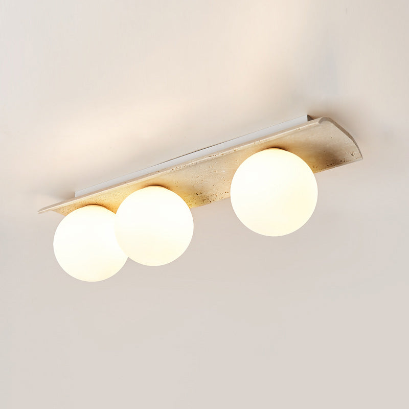 Serenaya bollen travertin glas plafondlamp