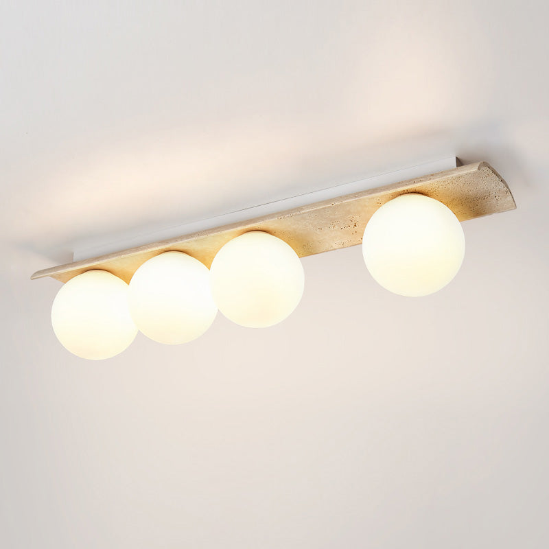 Serenaya bollen travertin glas plafondlamp