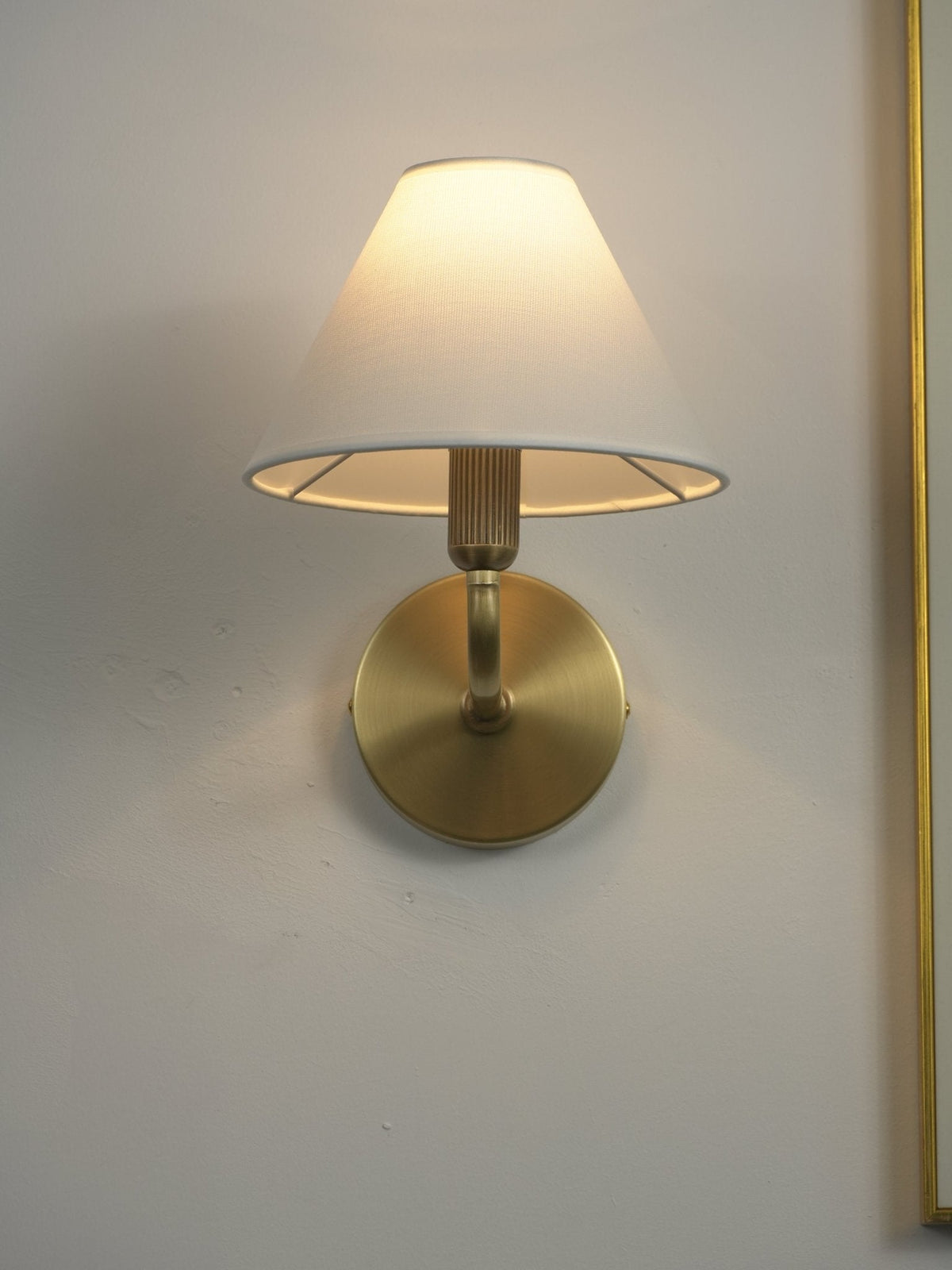Solivelle wandlamp met messing afwerking