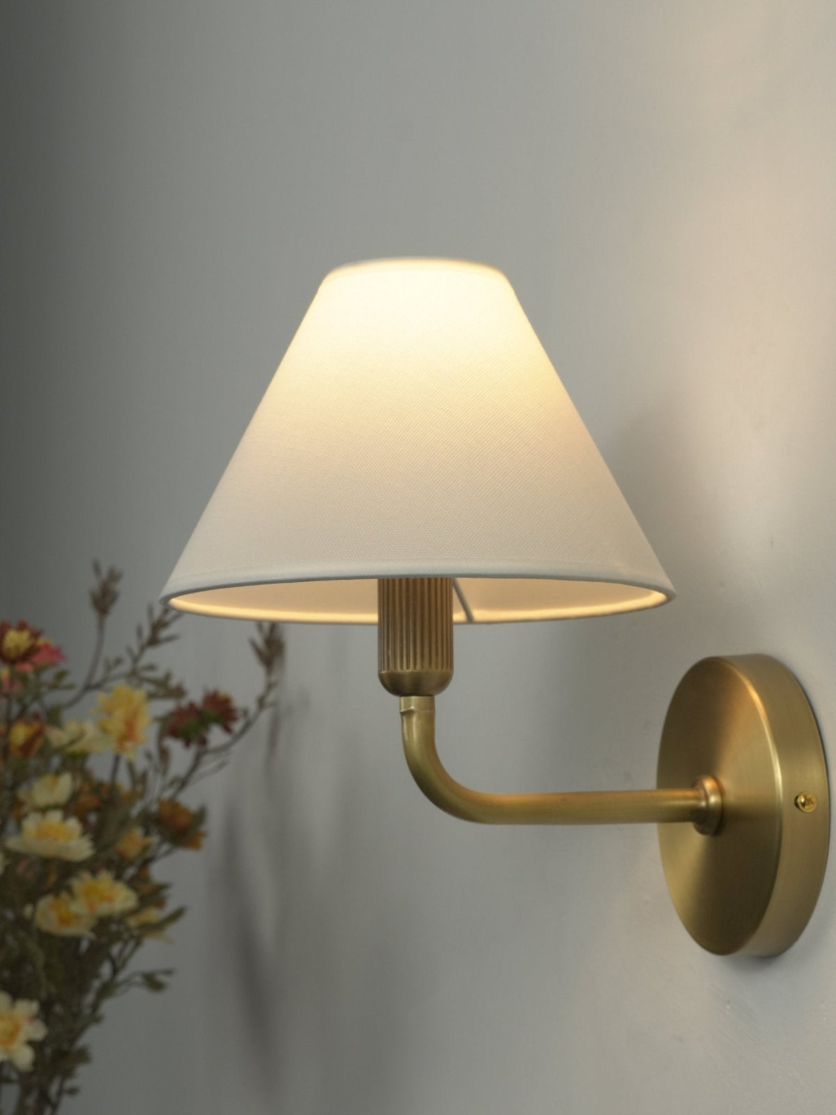 Solivelle wandlamp met messing afwerking