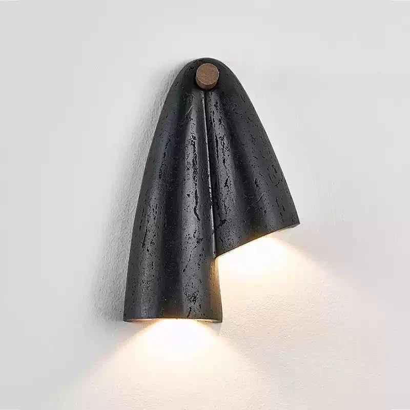 Kora Moderne wandlamp van zwart travertin