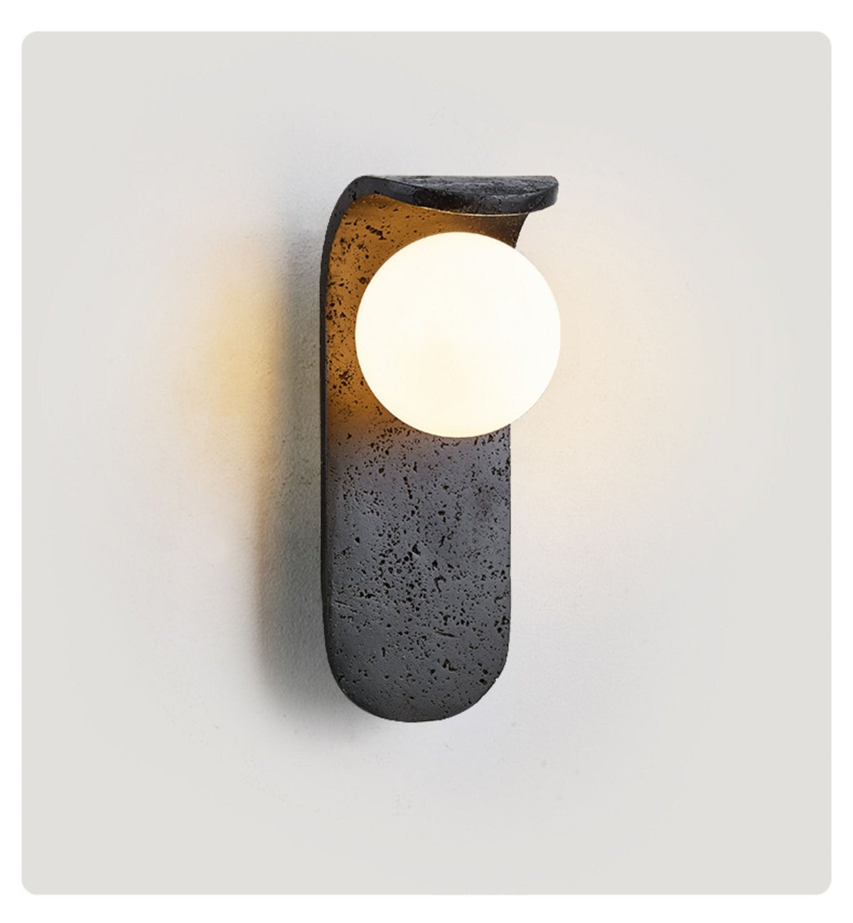 Serelora zwarte travertin wandlamp