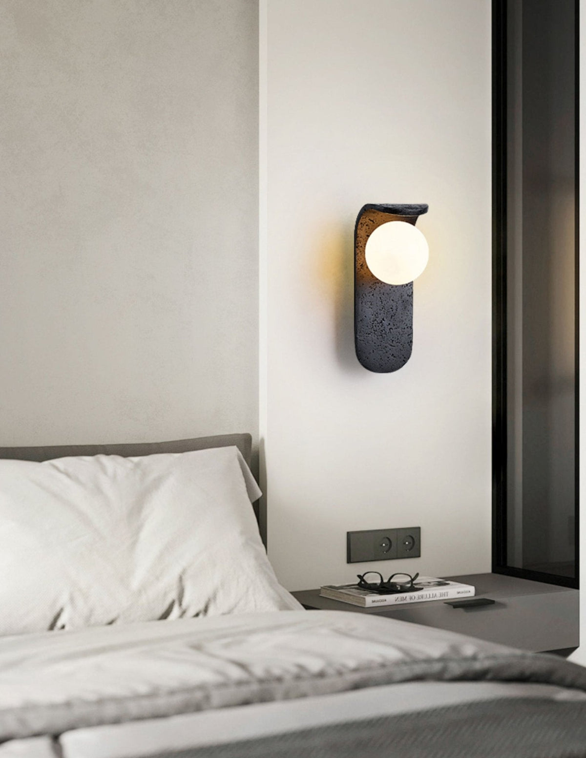 Serelora zwarte travertin wandlamp