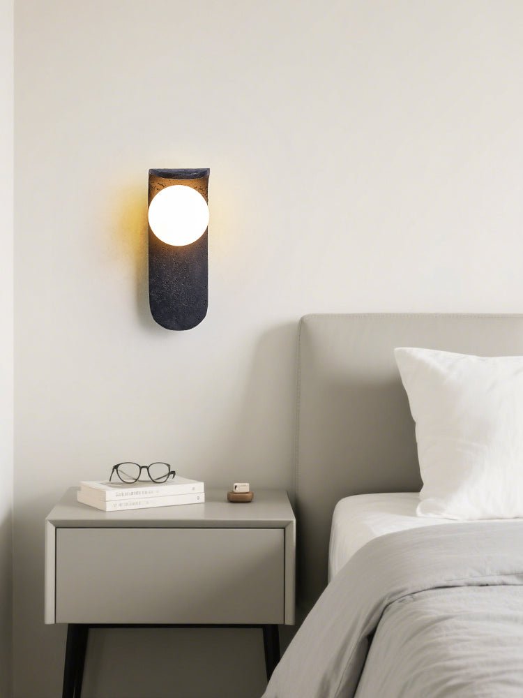 Serelora zwarte travertin wandlamp