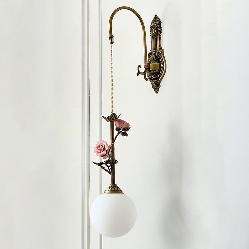 Elaararia wandlamp met antieke afwerking en roze