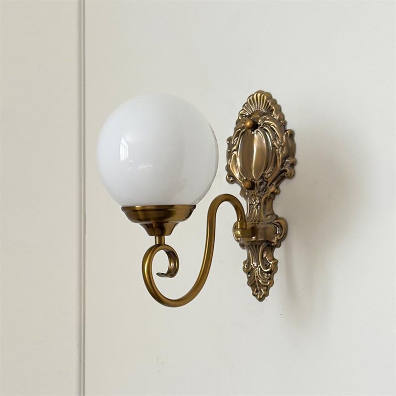 Lavinia wandlamp met en roze afwerking