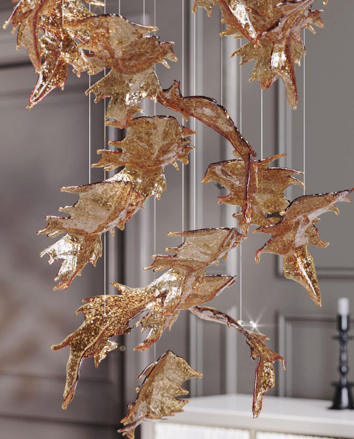 Cosolion kroonluchter met vogels in amberkleurig helder glas