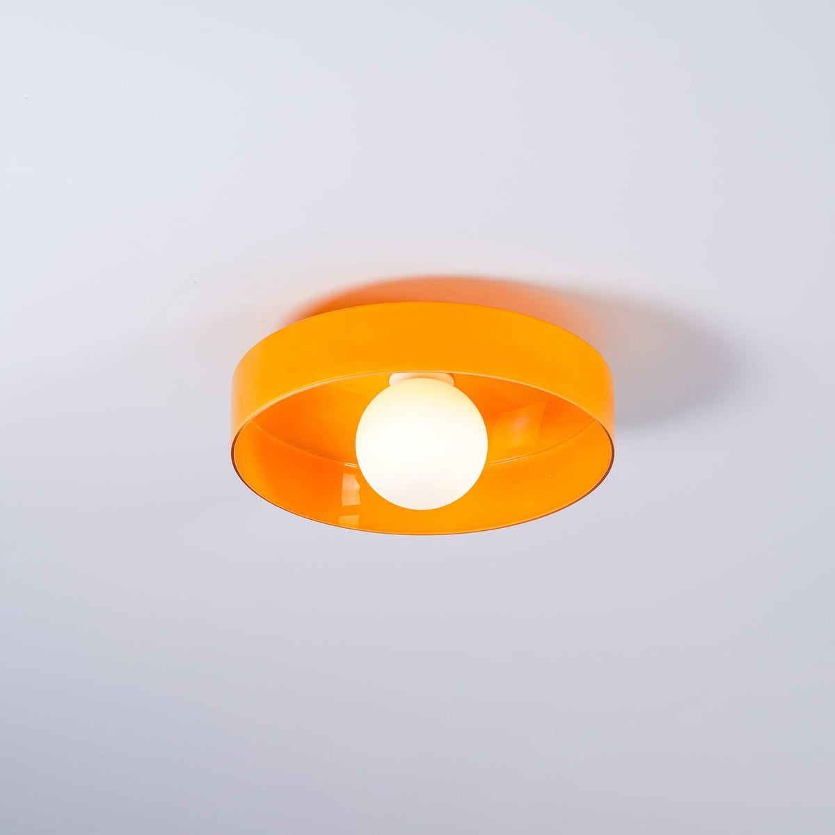 Diroxen plafondlamp oranje ring speels sculpturaal