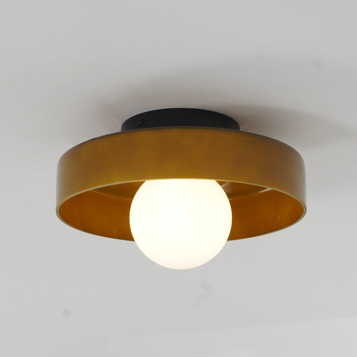 Diroxen plafondlamp oranje ring speels sculpturaal