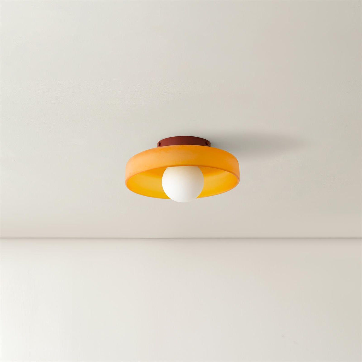 Diroxen plafondlamp oranje ring speels sculpturaal