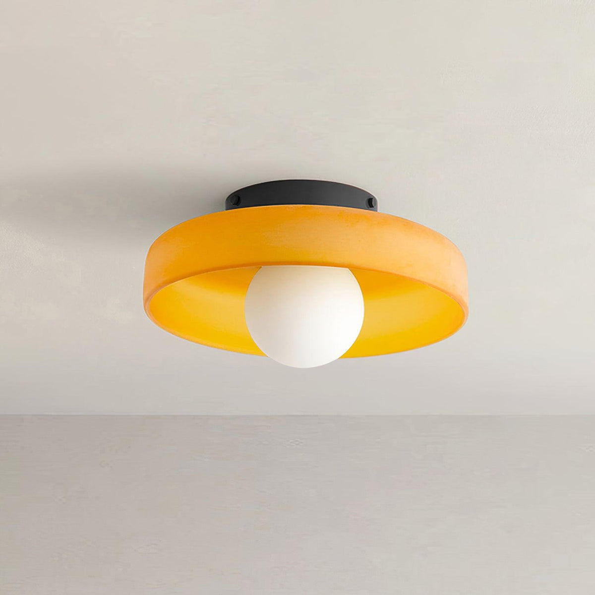 Diroxen plafondlamp oranje ring speels sculpturaal