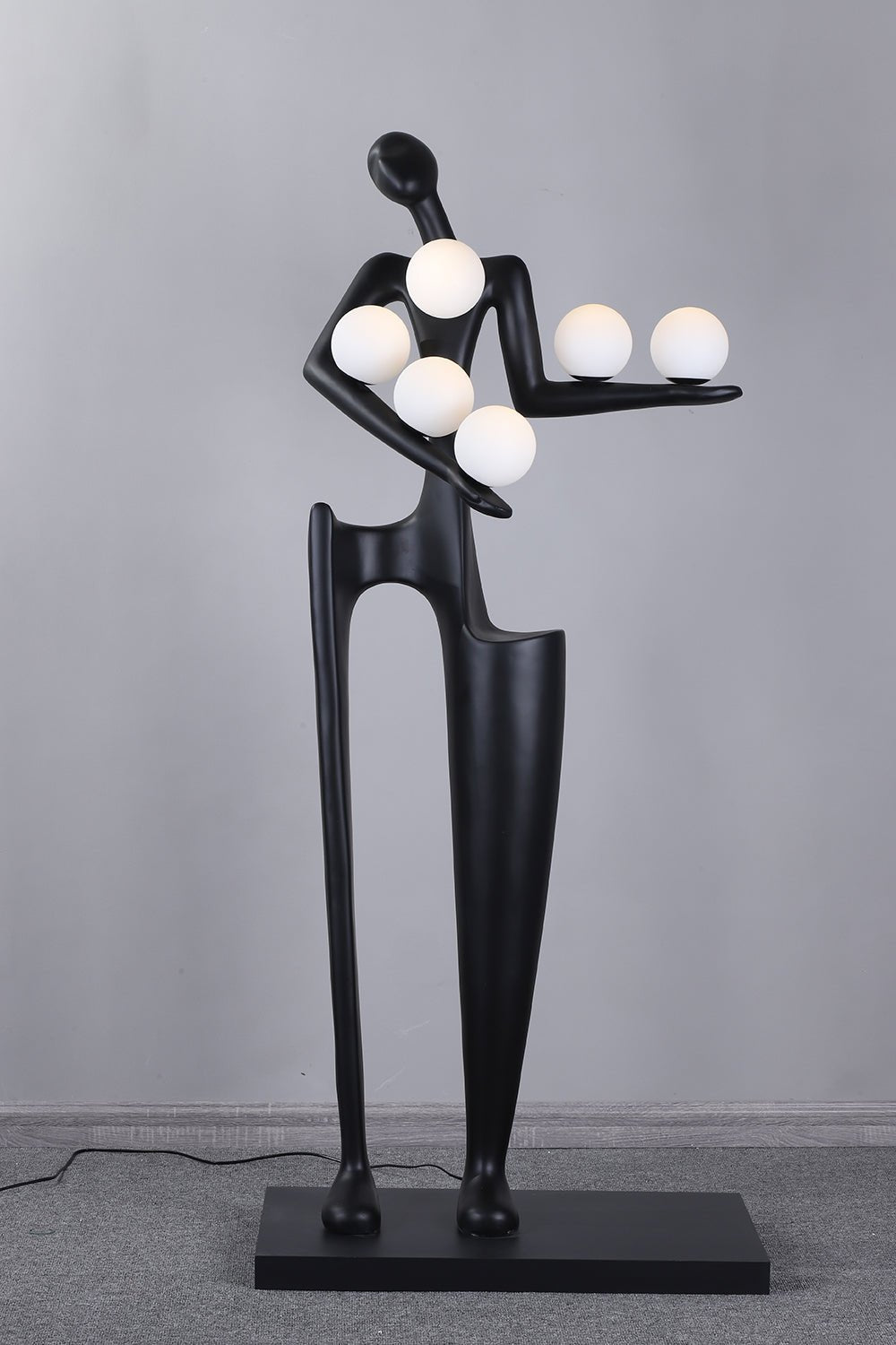 Viraeette kunststof vloerlamp in artistiek ontwerp
