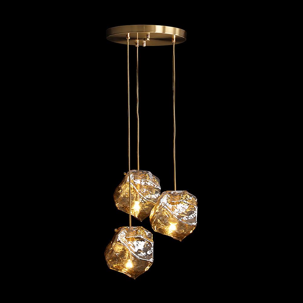 Kixu Luxe hanglamp van messing met amberkleurige kap