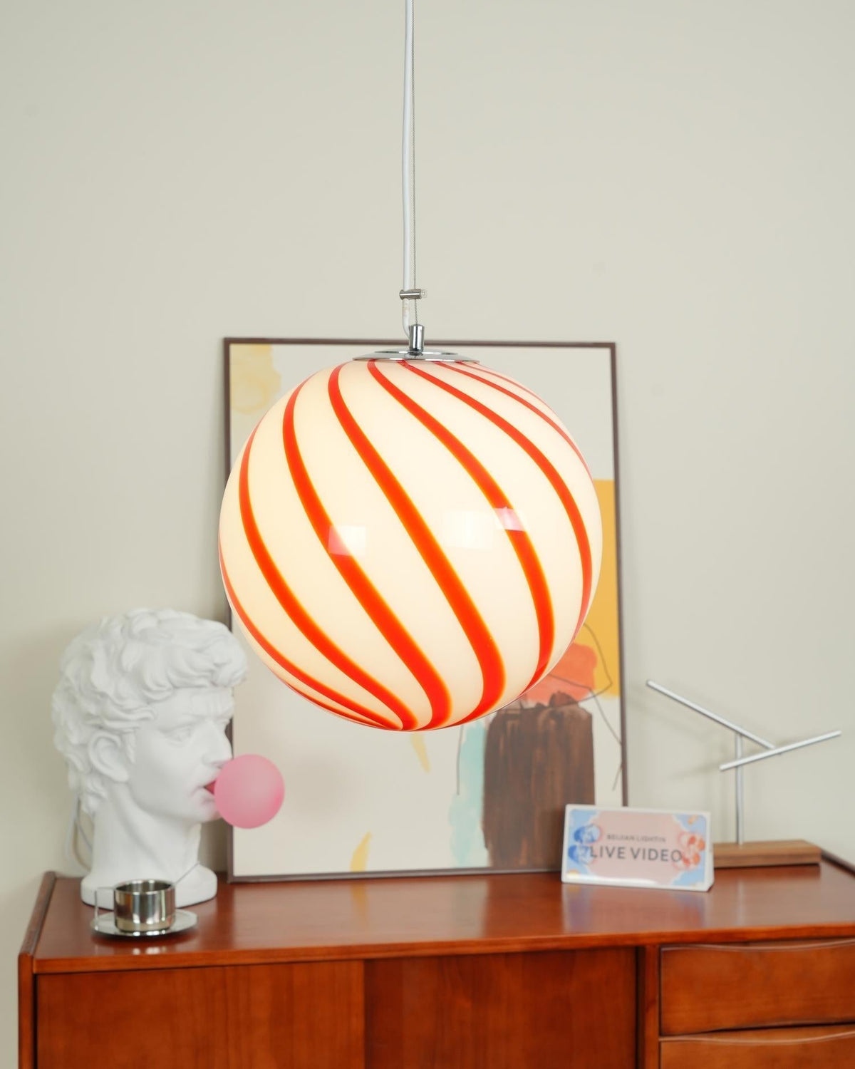 Kairo hanglamp met glazen bol en groene spiraalstrepen