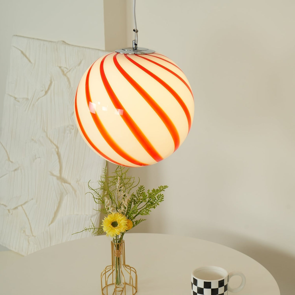 Kairo hanglamp met glazen bol en groene spiraalstrepen