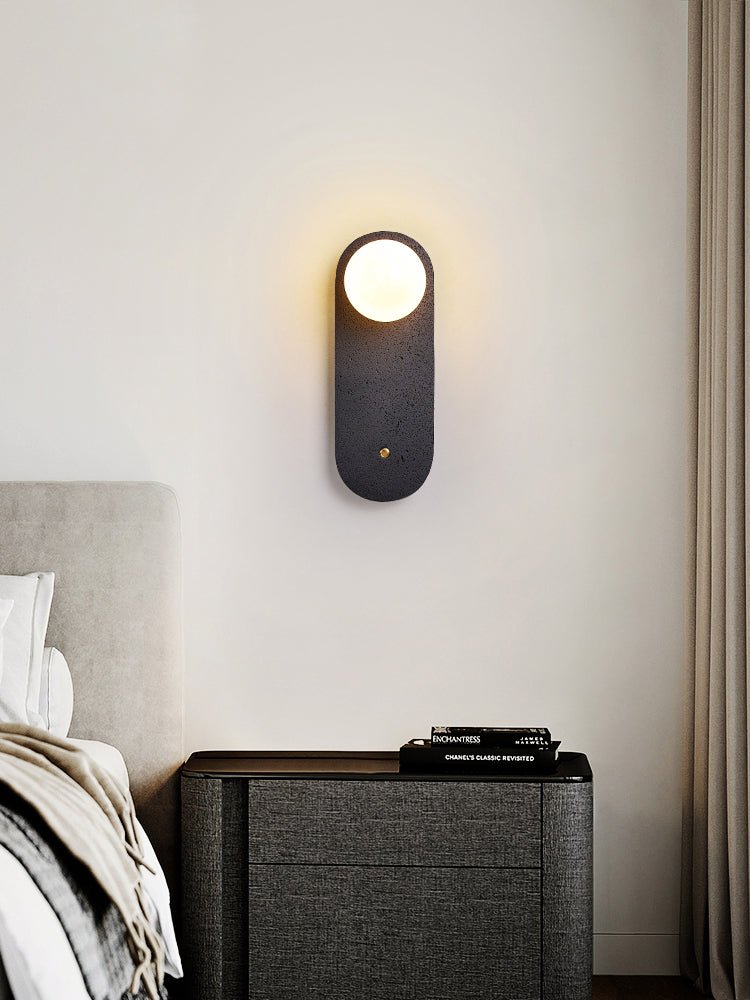 Taveella zwarte wandlamp in travertin