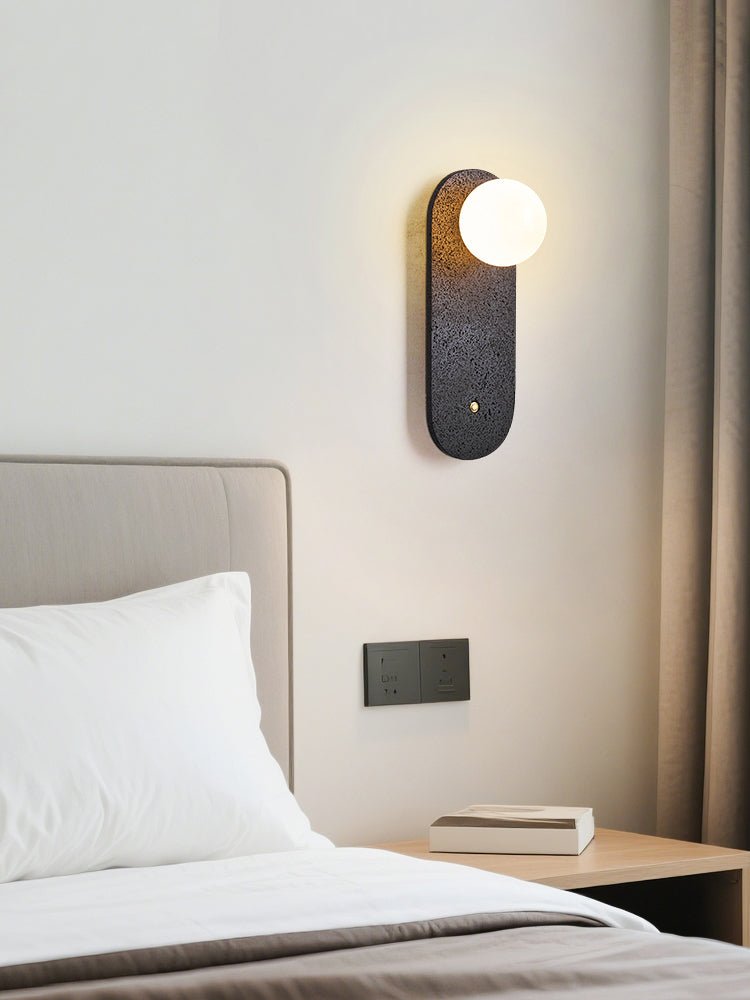 Taveella zwarte wandlamp in travertin