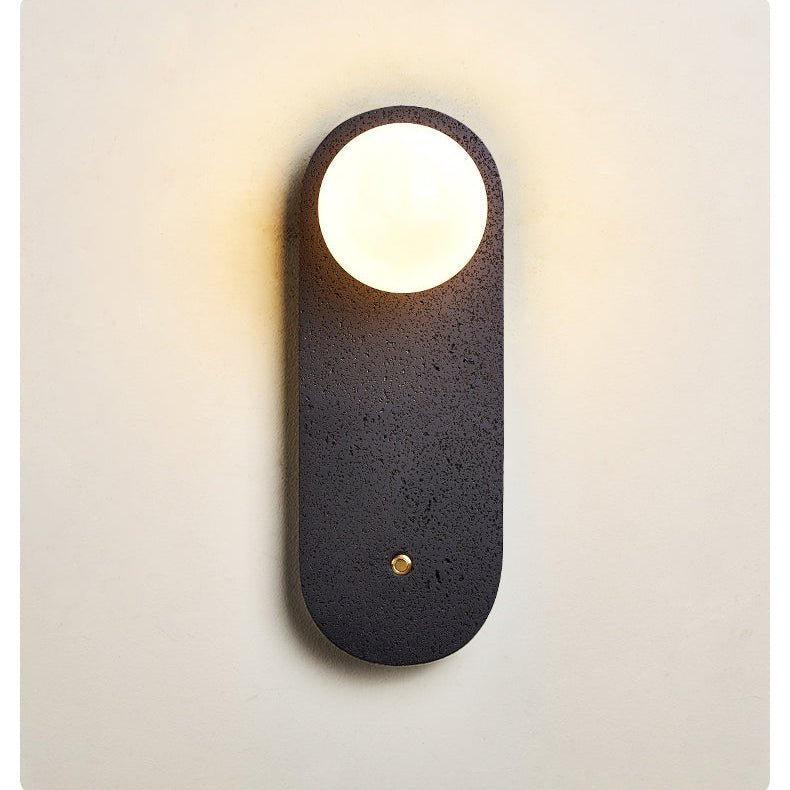 Taveella zwarte wandlamp in travertin
