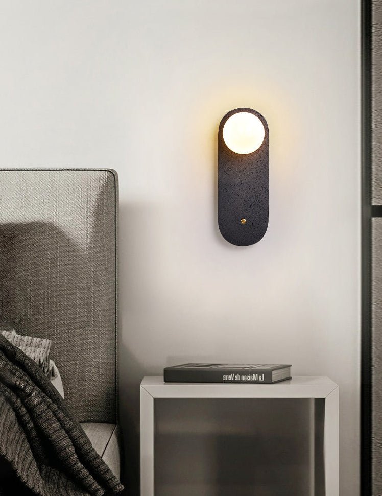 Taveella zwarte wandlamp in travertin