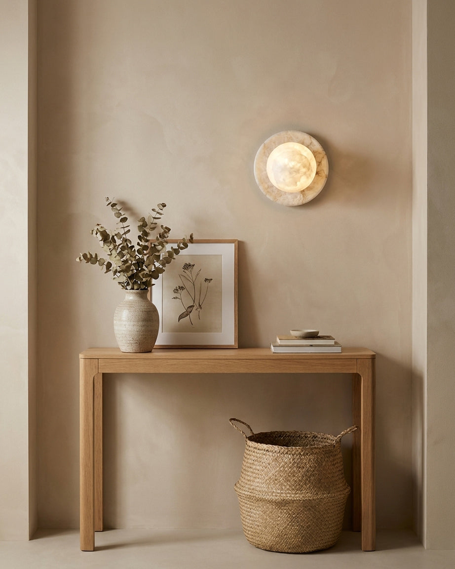 Niveeria bolvormige albasten wandlamp