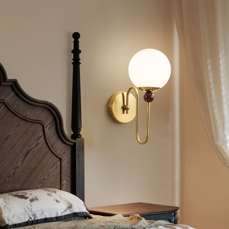 Jorvyn wandlamp met lusarm