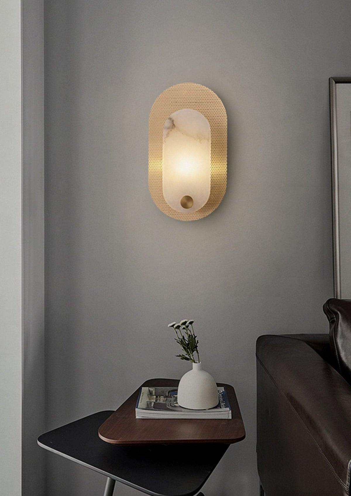 Perforated ovaal wandlamp in albast