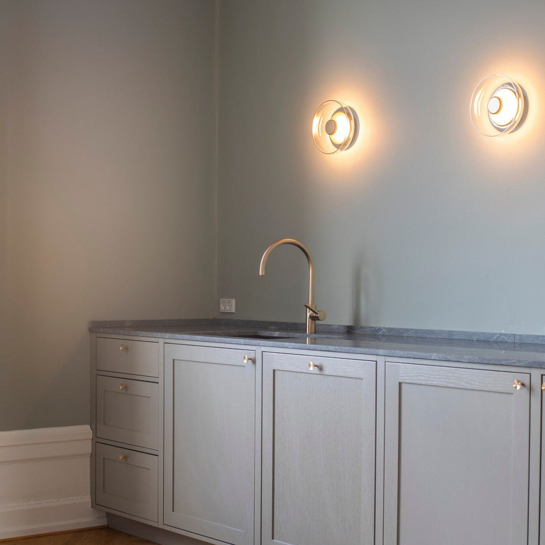 Aether messing wandlamp met glazen kap