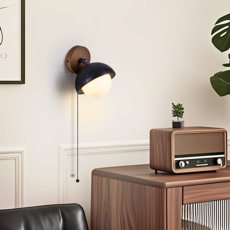Serenaria bollen Zwart travertin Draaibaar wandlamp