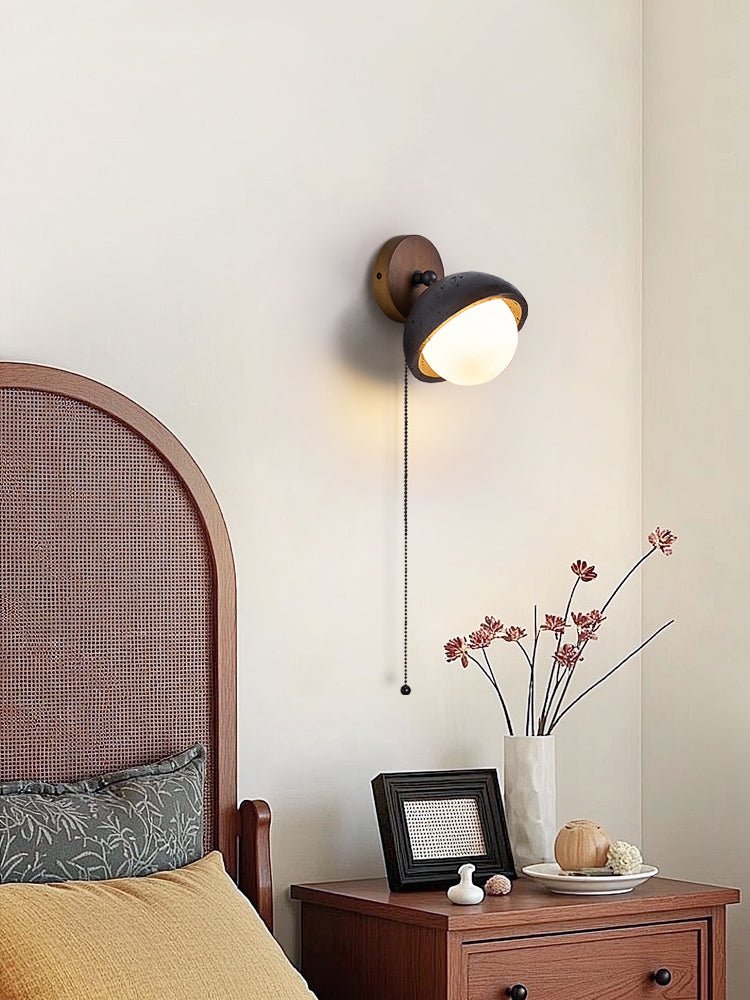 Serenaria bollen Zwart travertin Draaibaar wandlamp