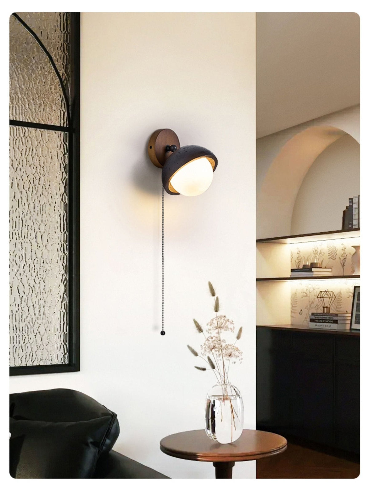 Serenaria bollen Zwart travertin Draaibaar wandlamp