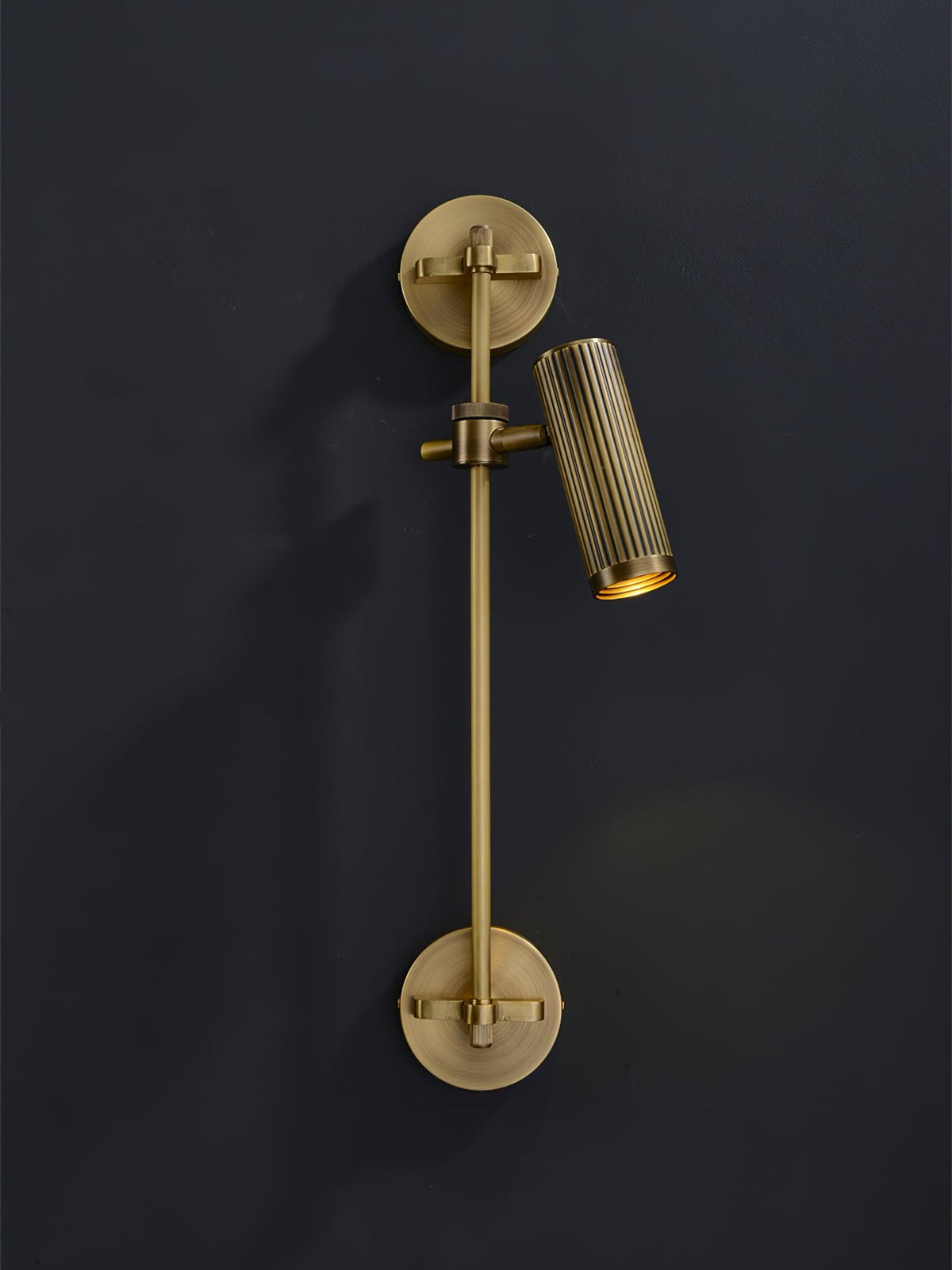Kirixel wandlamp in messing
