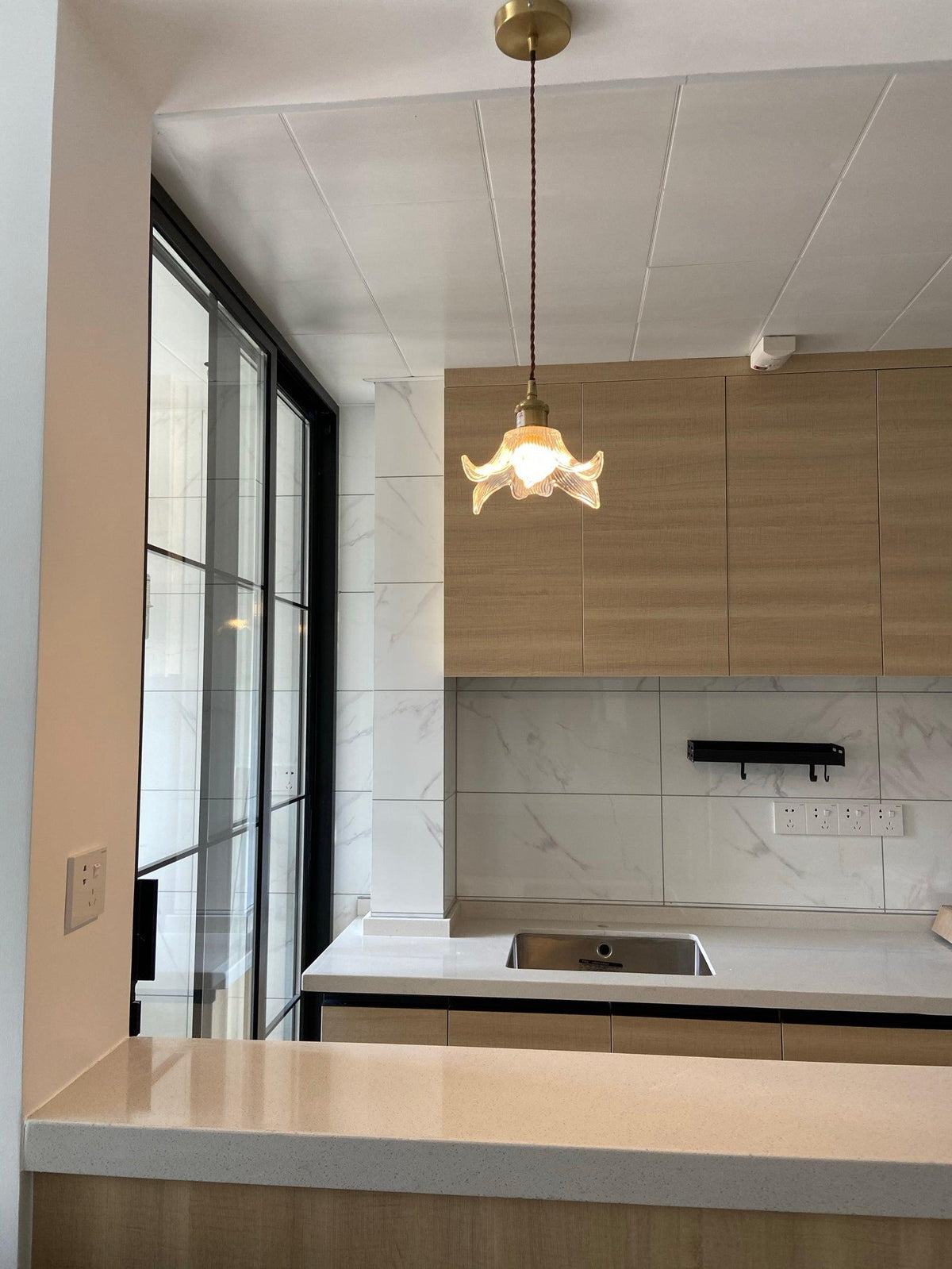 Aell hanglamp van messing en glas met glamoureus-ontwerp