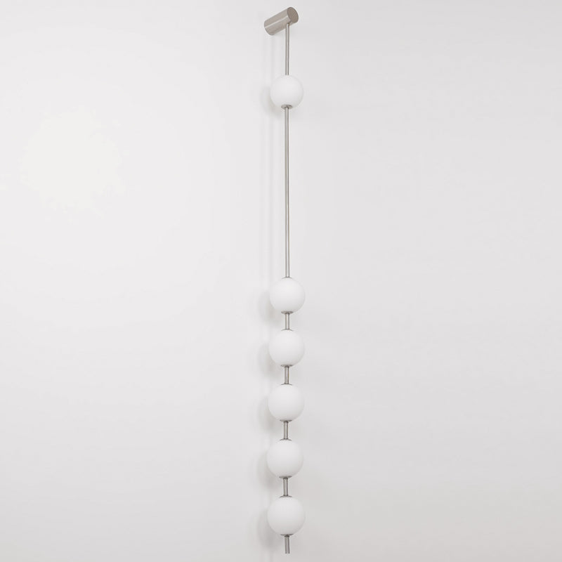 Soloiella wandlamp met verticale bollen van messing