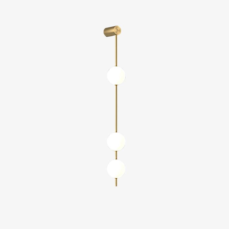 Soloiella wandlamp met verticale bollen van messing