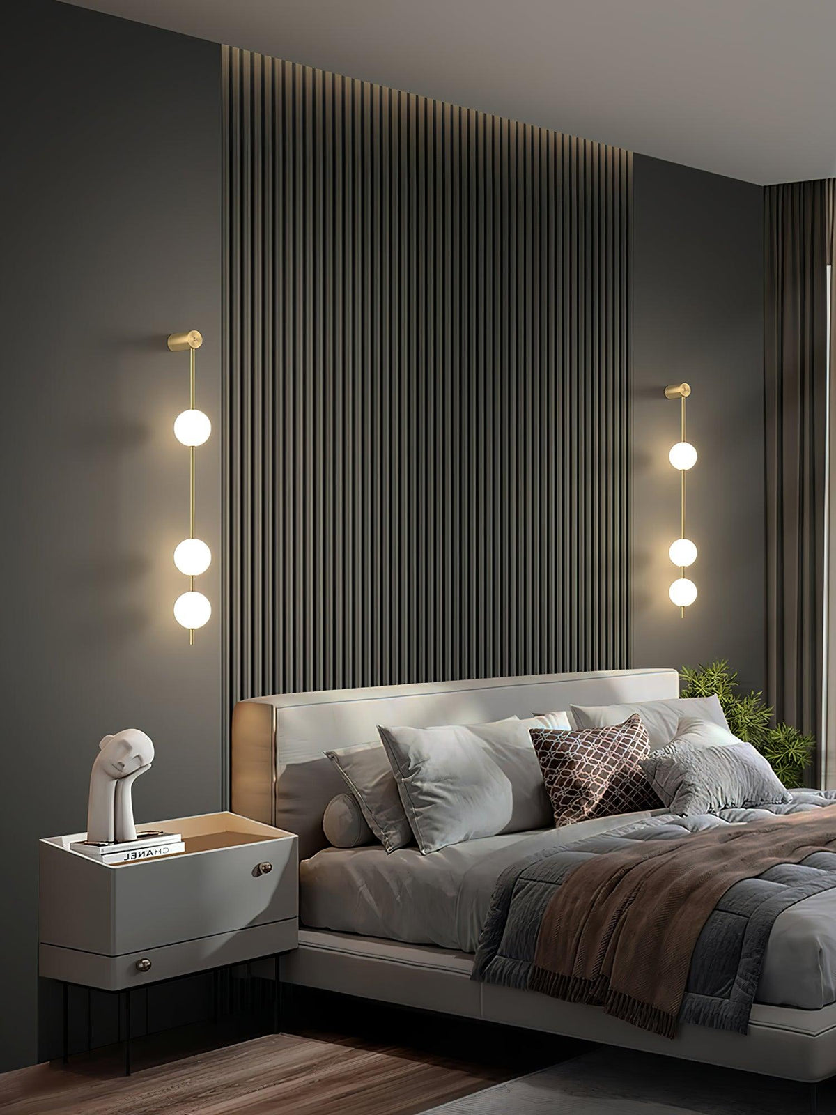 Soloiella wandlamp met verticale bollen van messing
