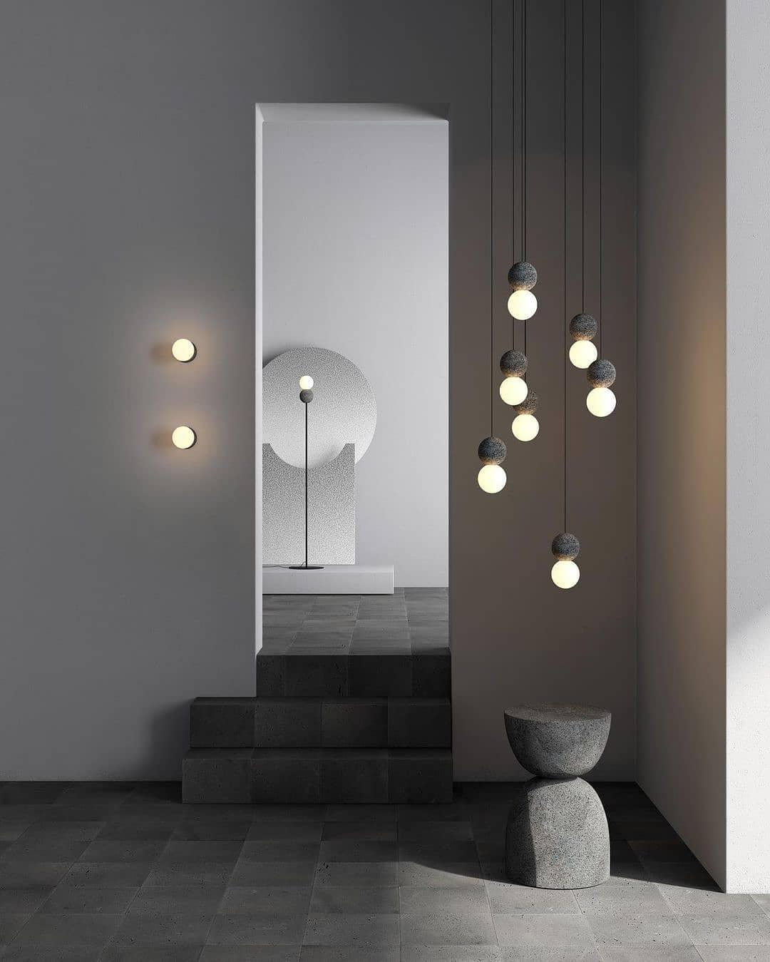 Eirinise wandlamp van beton en melkglas